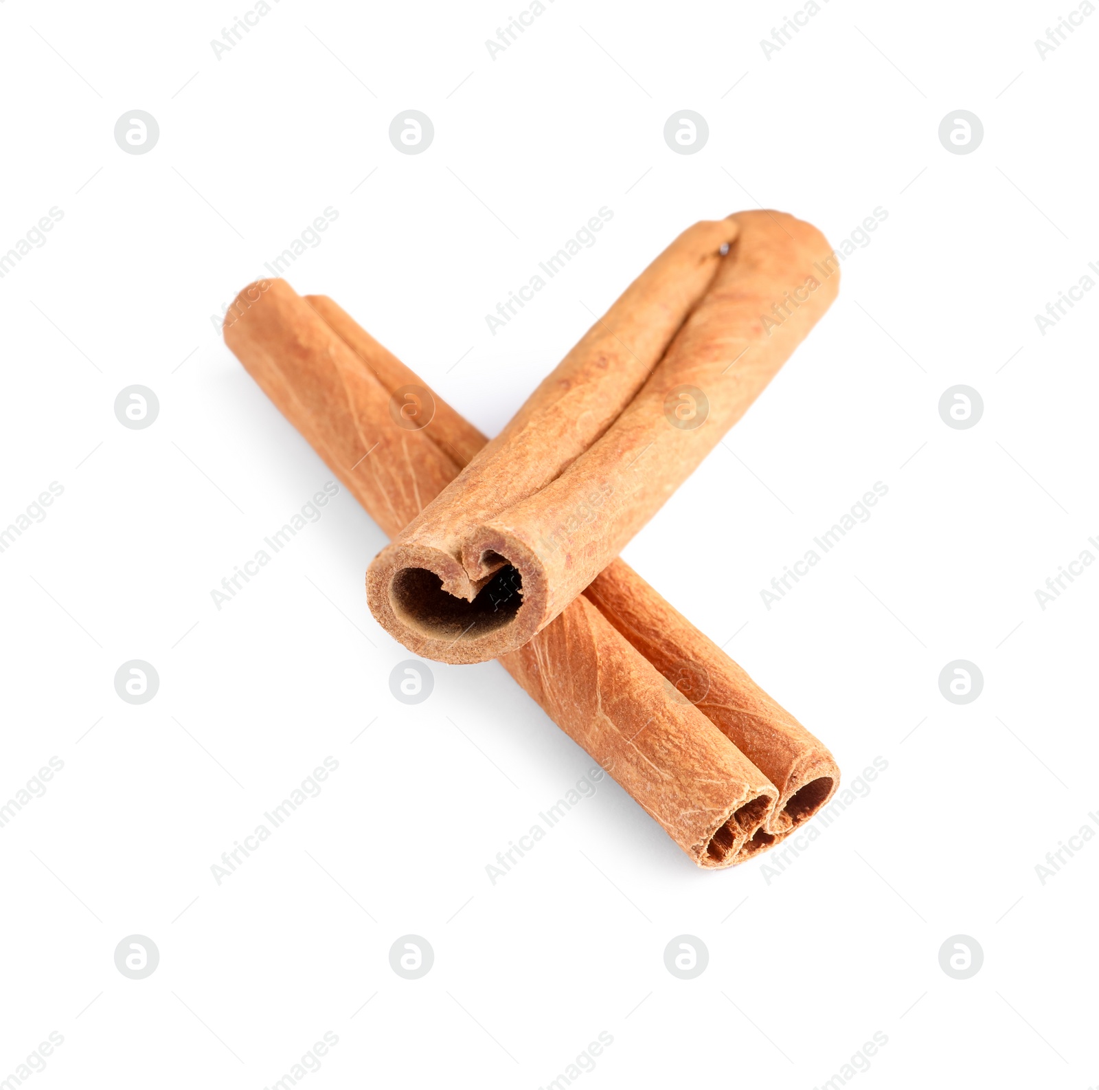 Photo of Two aromatic cinnamon sticks isolated on white