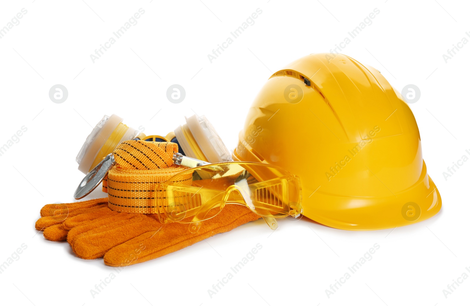 Photo of Protective workwear on white background. Safety equipment