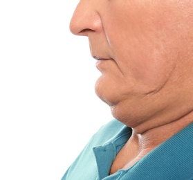 Mature man with double chin on white background, closeup