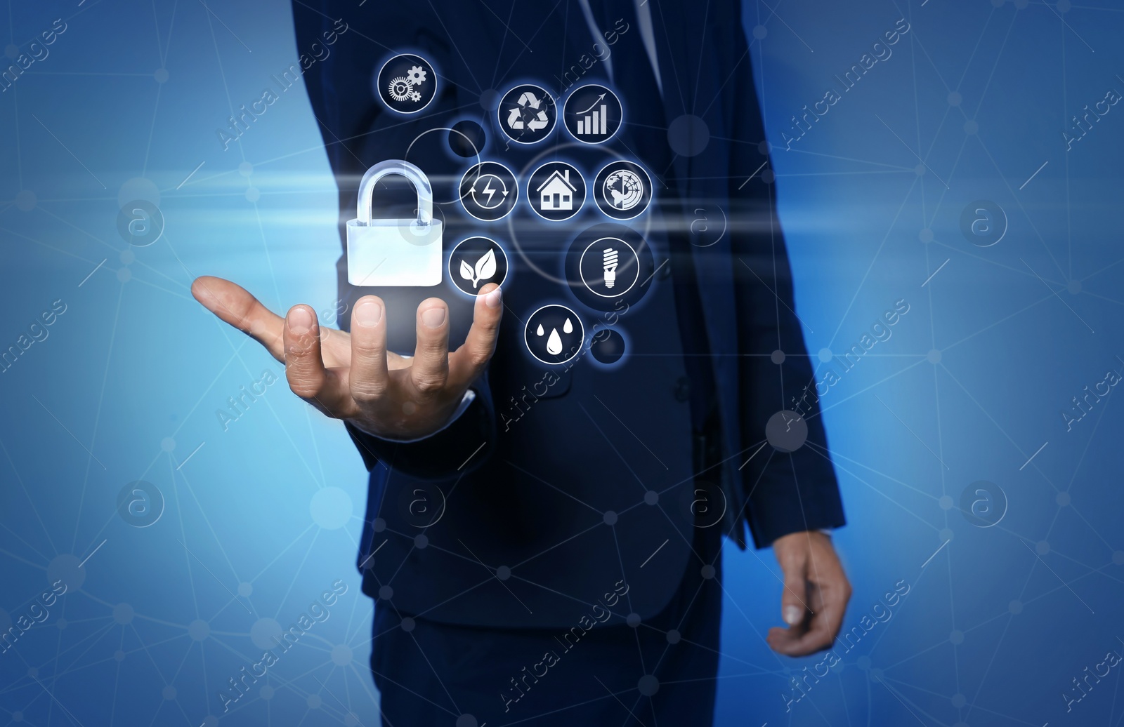 Image of Home security concept. Man holding lock on light blue background, closeup