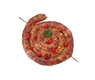 Photo of Ring of delicious homemade sausage with peppers isolated on white, top view