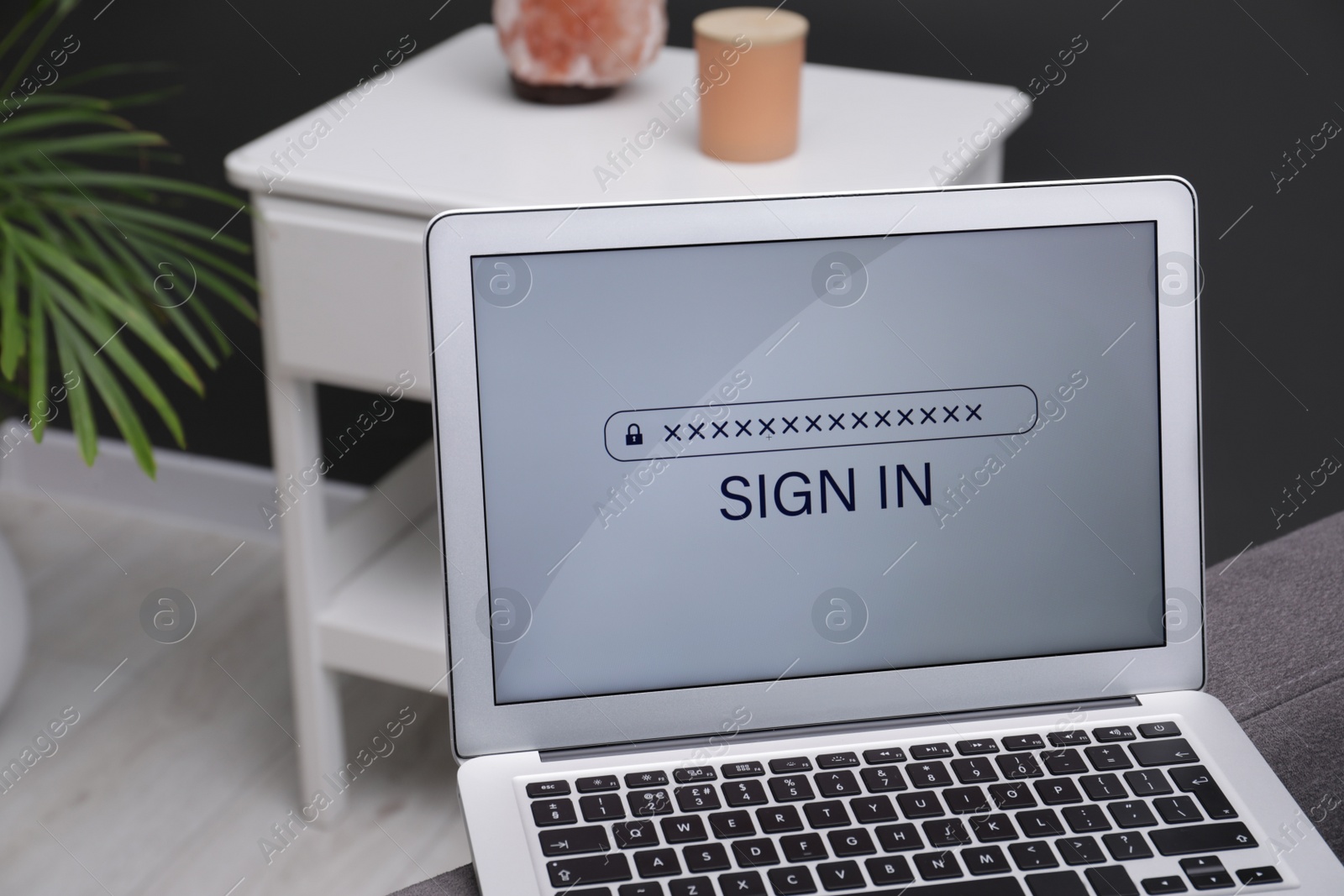 Photo of Laptop with blocked screen indoors, closeup view