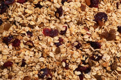 Sweet tasty granola as background, top view