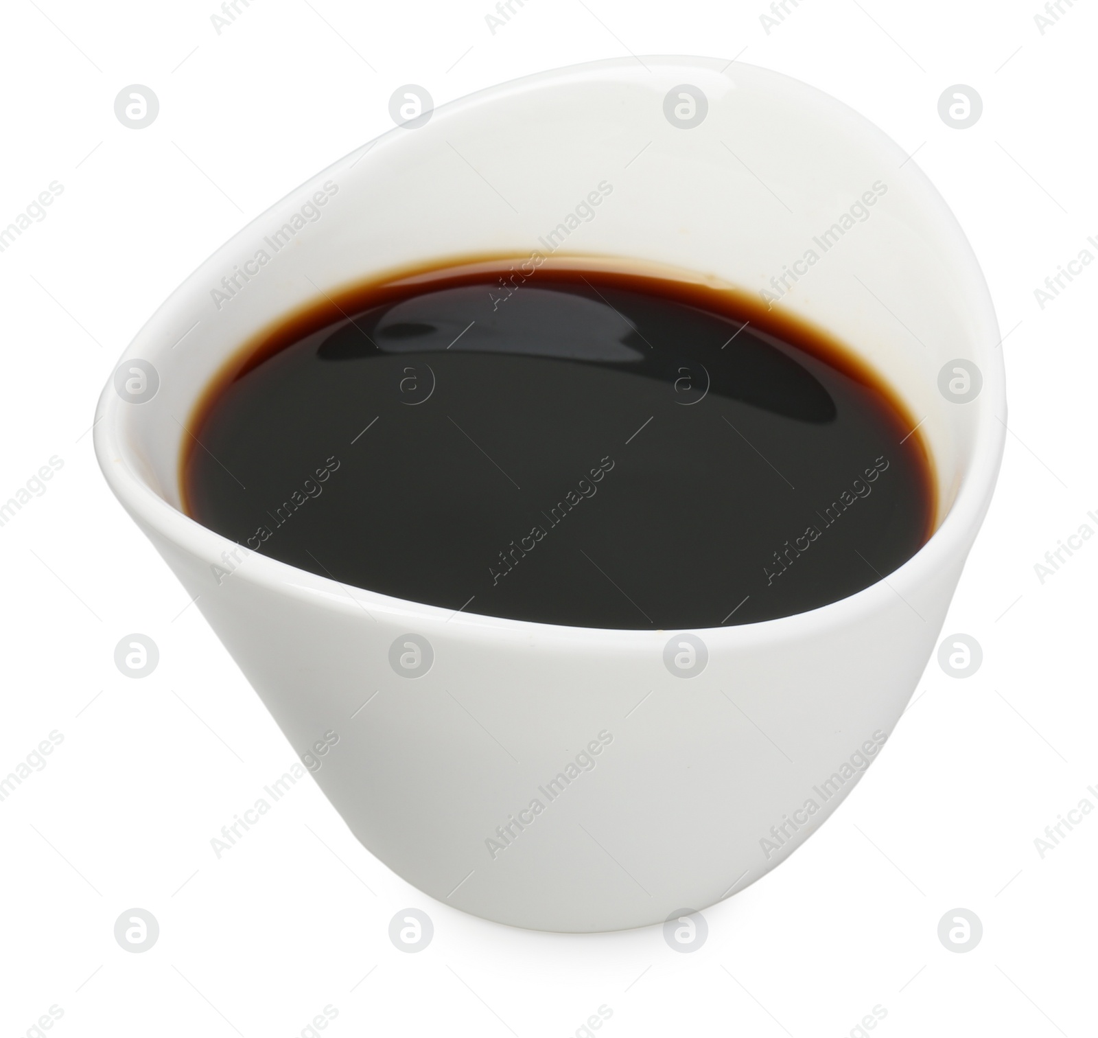 Photo of Tasty soy sauce in bowl isolated on white