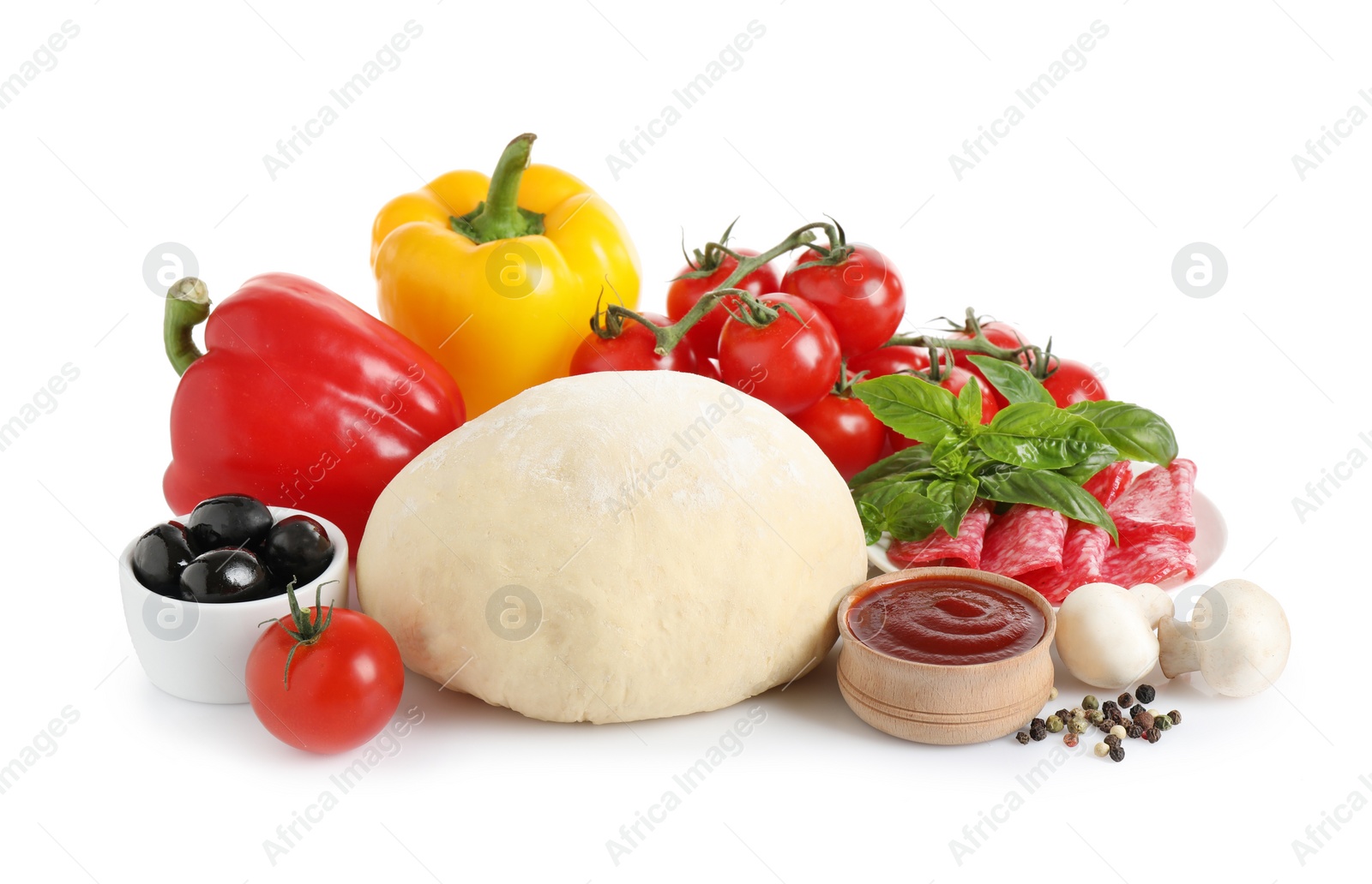 Photo of Fresh dough and ingredients for pizza on white background