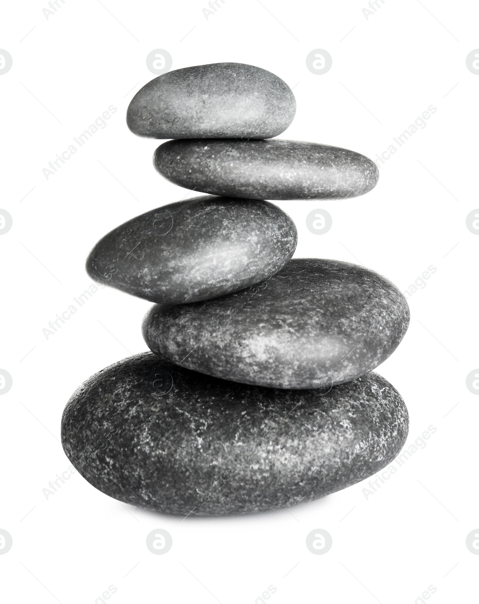 Photo of Stack of zen spa stones on white background