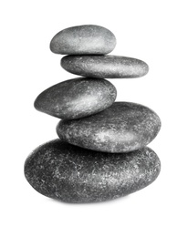 Photo of Stack of zen spa stones on white background