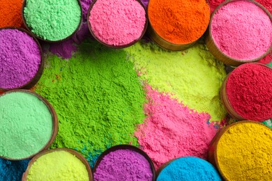 Colorful powder dyes as background, top view. Holi festival