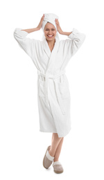 Photo of Young woman in bathrobe on white background