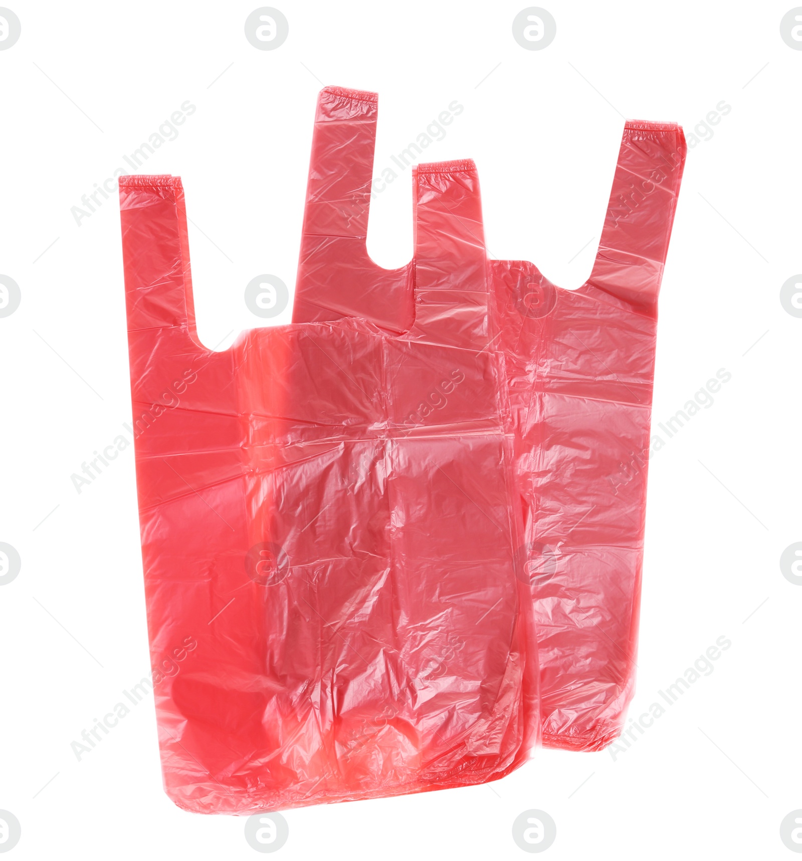 Photo of Stack of plastic bags isolated on white, top view