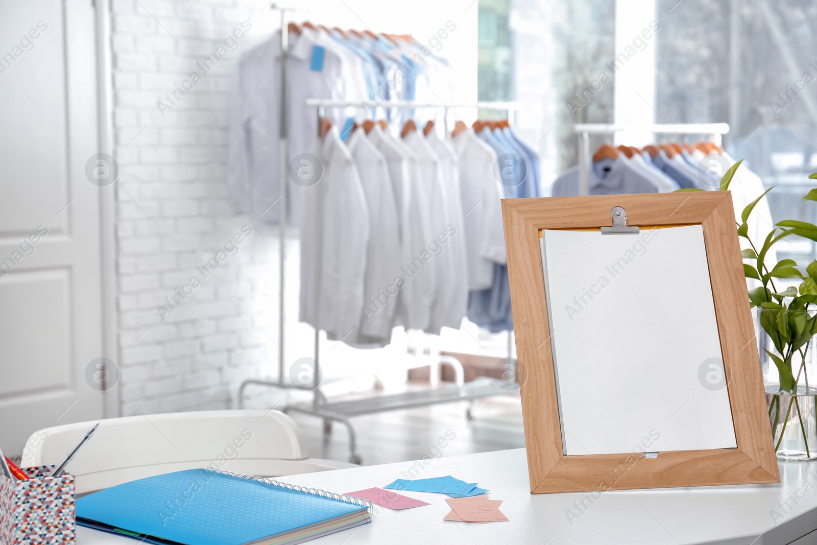 Photo of Workplace of receptionist at dry-cleaner's