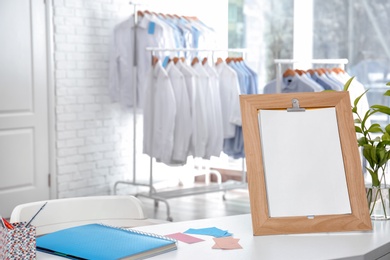 Workplace of receptionist at dry-cleaner's