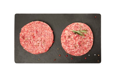 Photo of Raw hamburger patties with rosemary and spices on white background, top view