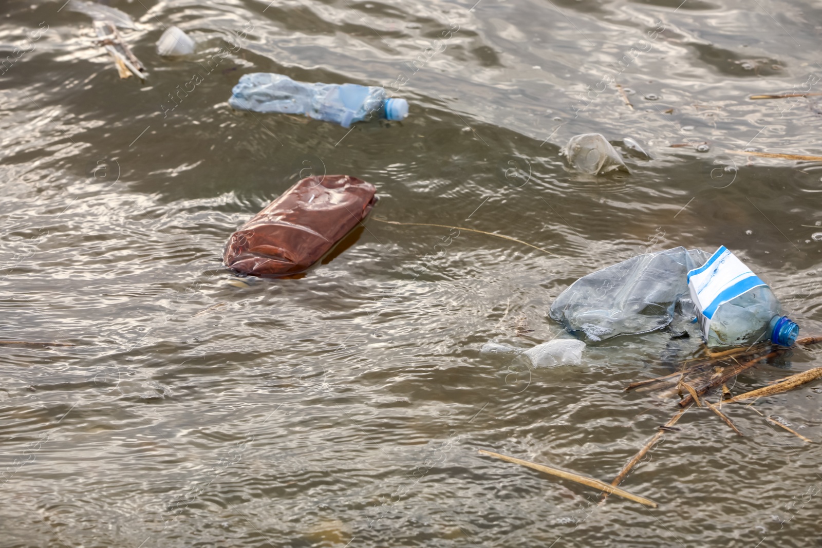 Photo of Plastic garbage floating in river. Environment pollution problem