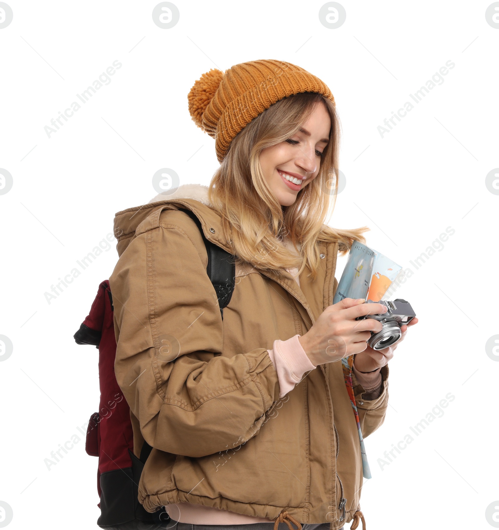 Photo of Woman with map and camera on white background. Winter travel