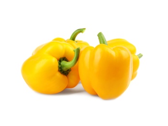 Ripe yellow bell peppers isolated on white