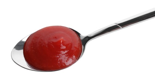 Photo of Spoon with tasty ketchup isolated on white, above view. Tomato sauce