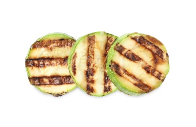 Photo of Delicious grilled zucchini slices on white background, top view