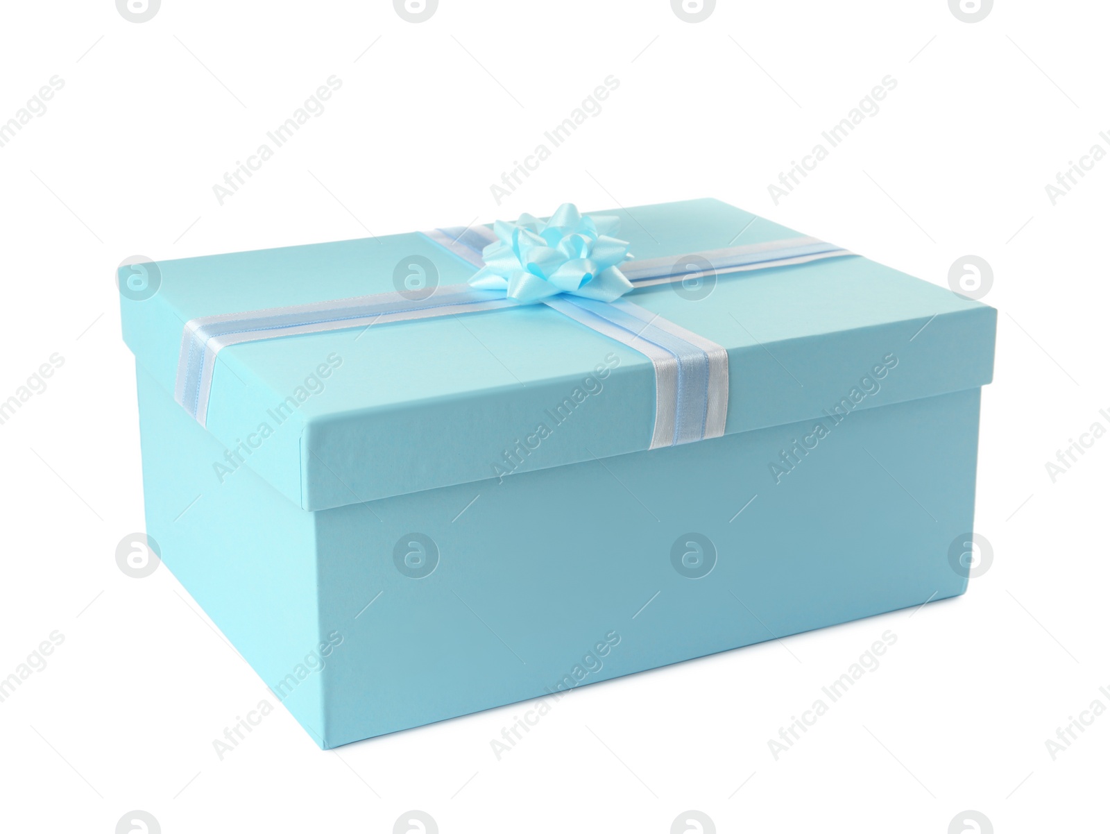 Photo of Light blue gift box with bow isolated on white