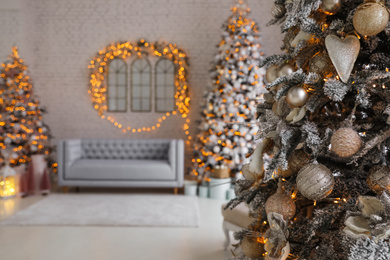 Beautiful Christmas tree in decorated living room interior