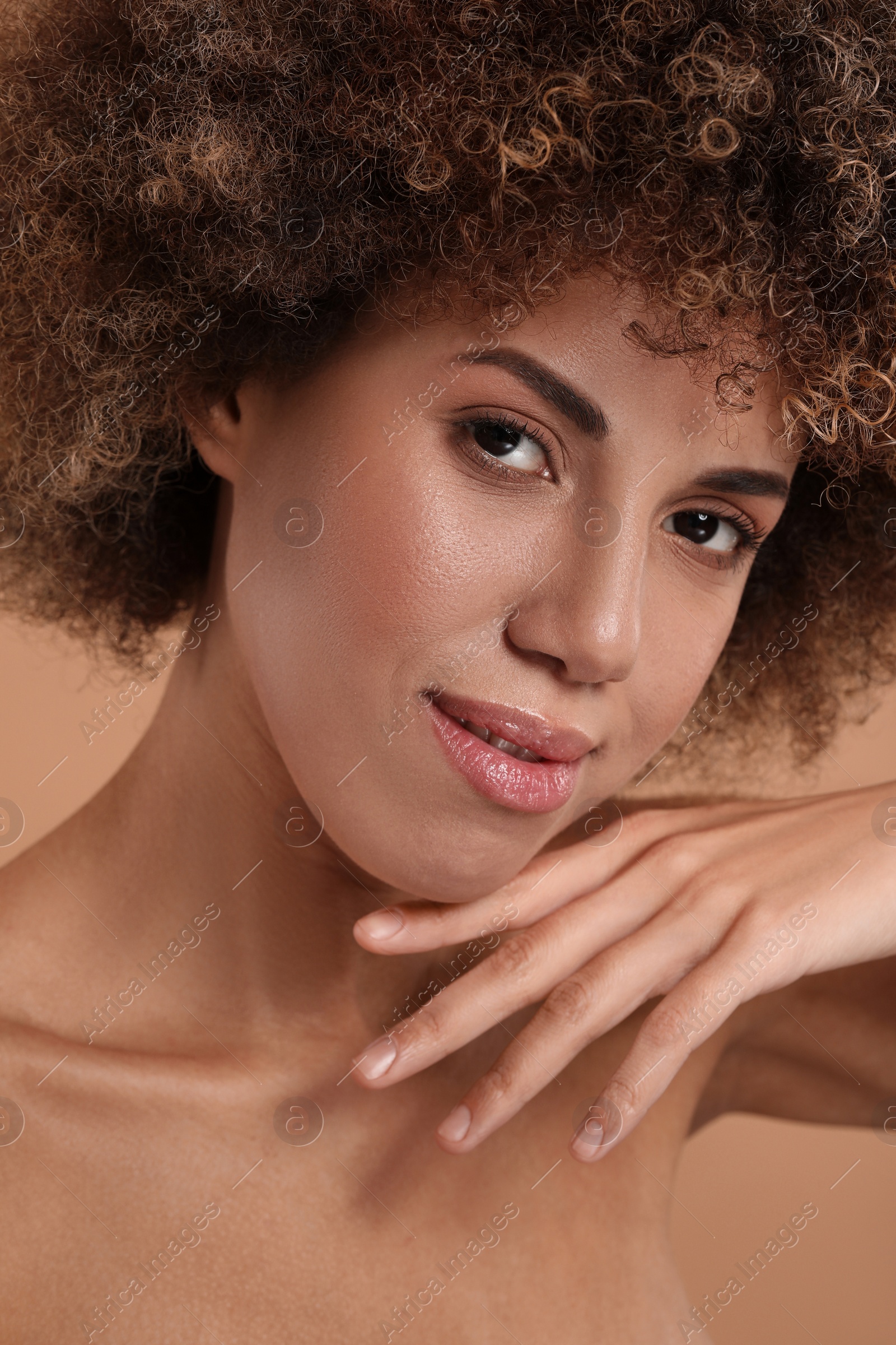 Photo of Beautiful woman with healthy skin on beige background