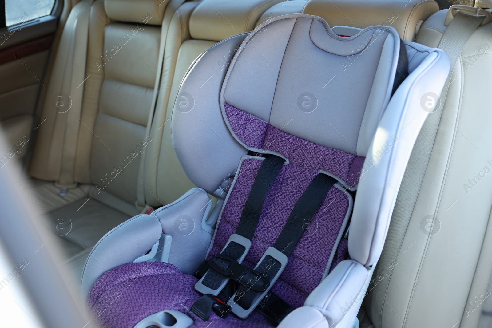 Photo of Empty modern child safety seat inside car