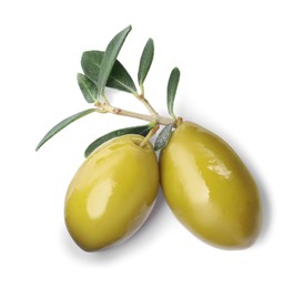 Photo of Olives with green leaves on white background, top view