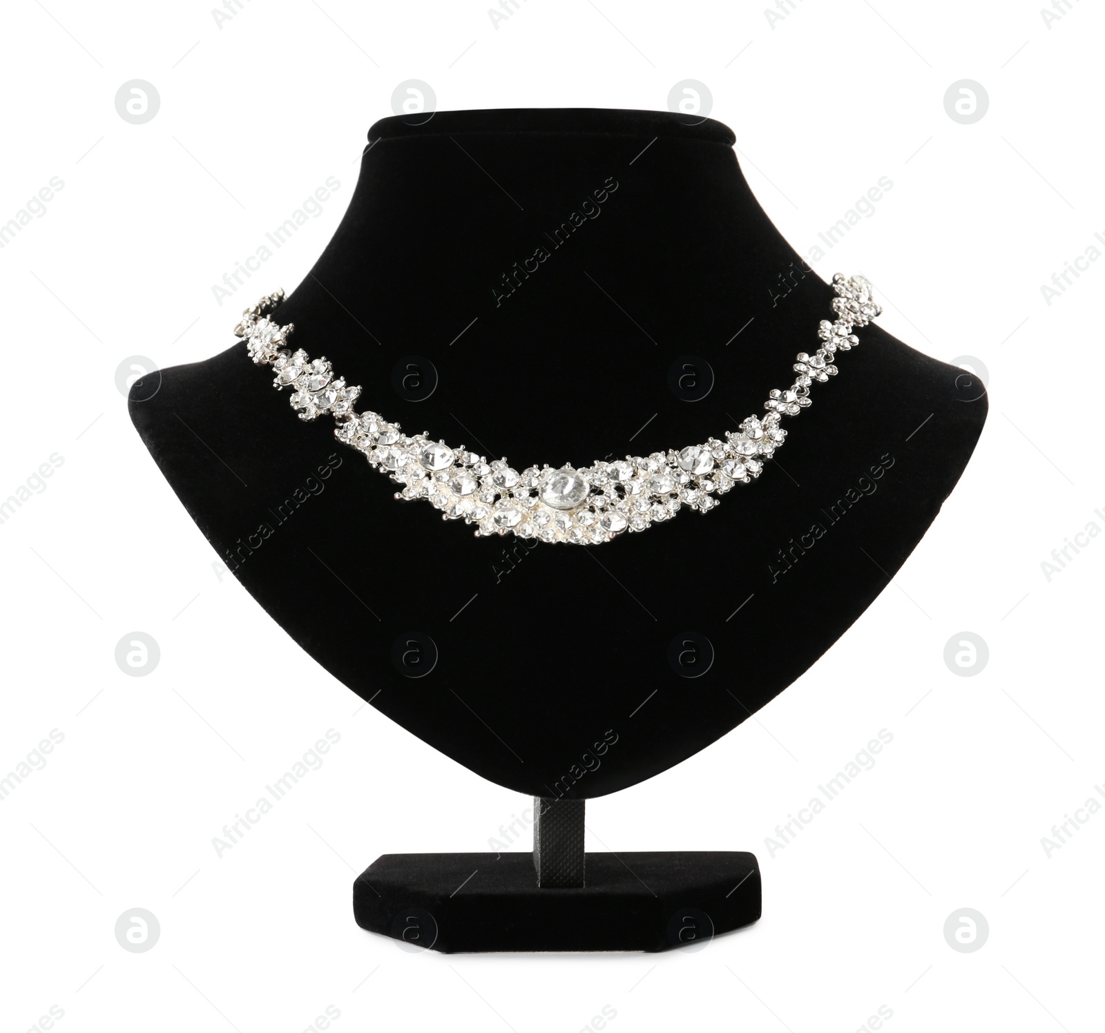 Photo of Stylish necklace with gemstones on jewelry bust against white background