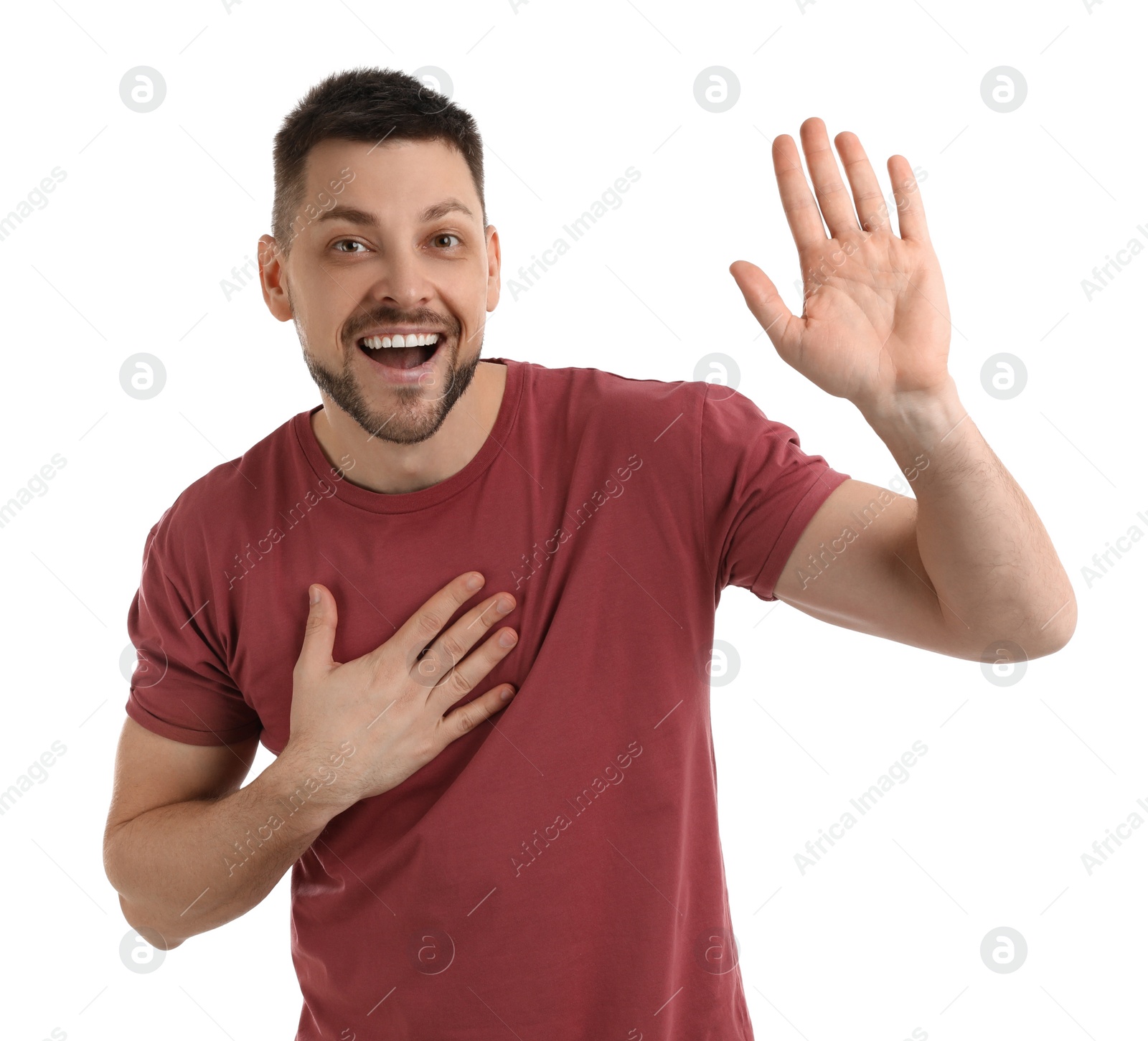 Photo of Cheerful man waving to say hello on white background