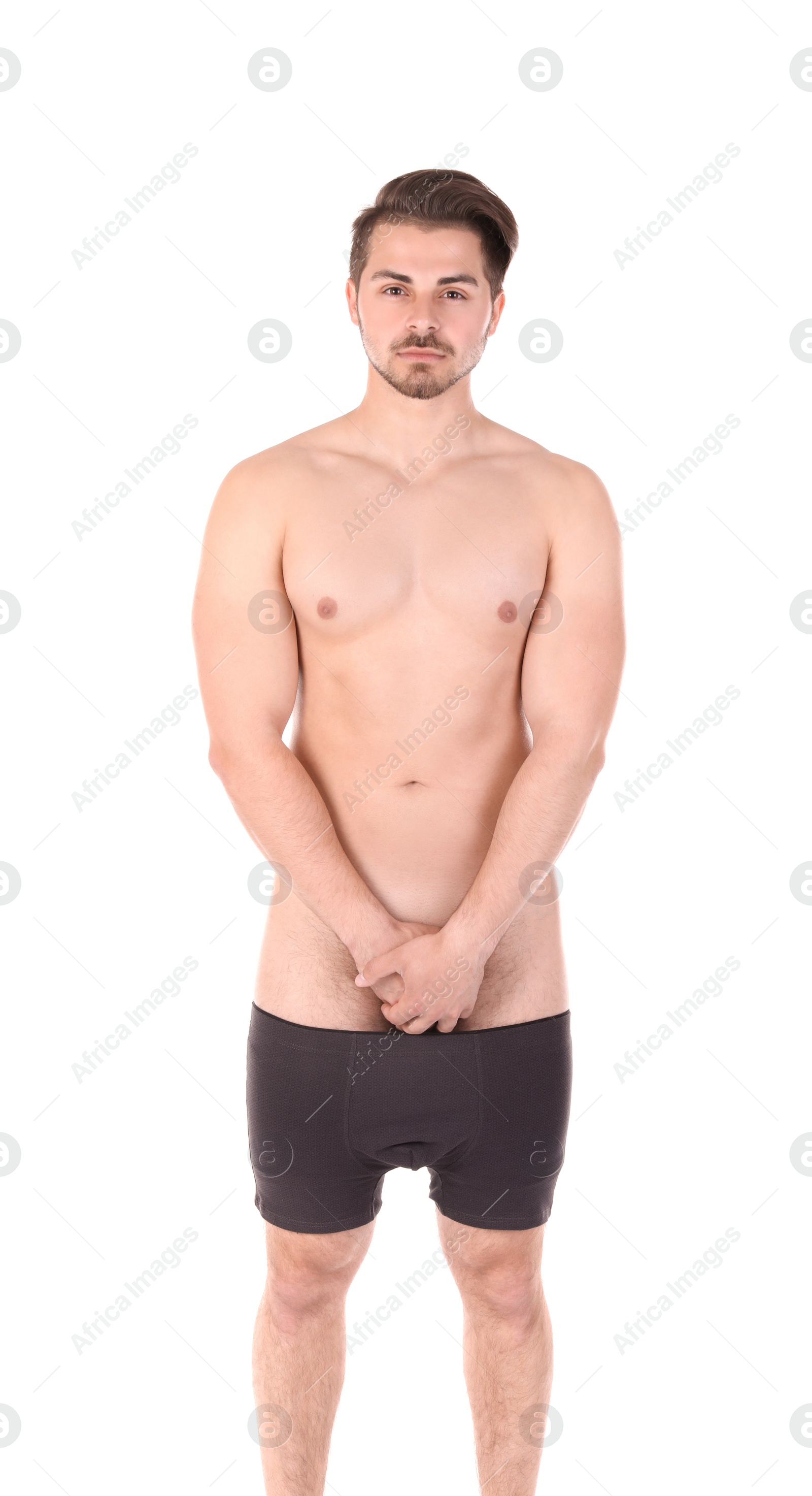 Photo of Young man with urological problems on white background