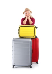 Senior woman with suitcases on white background. Vacation travel