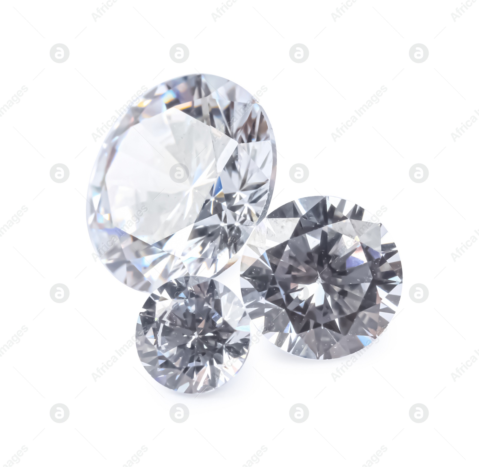 Photo of Different beautiful shiny diamonds isolated on white