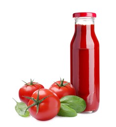 Image of Organic ketchup in glass bottle, fresh tomatoes and basil on white background