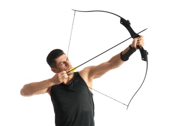 Man with bow and arrow practicing archery on white background