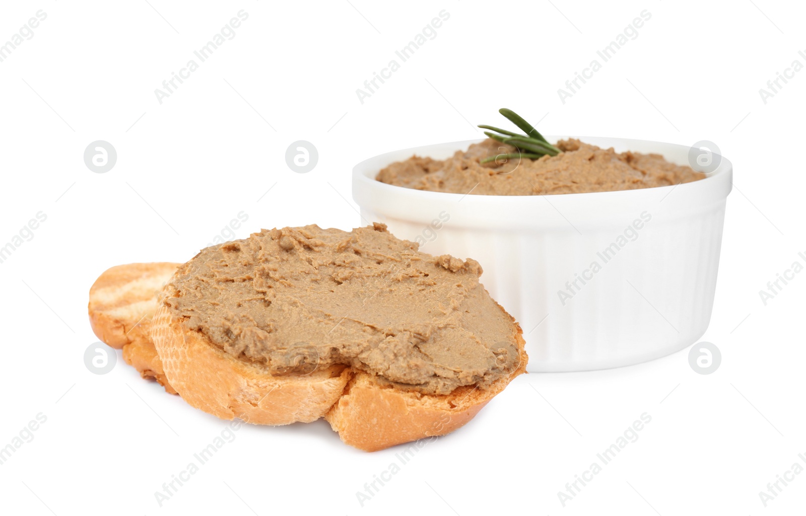 Photo of Fresh bread and bowl with delicious liver pate on white background