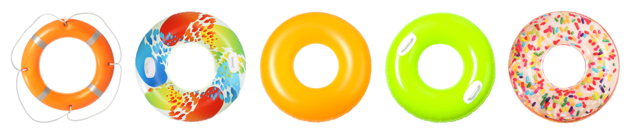 Image of Set with bright inflatable rings on white background, banner design