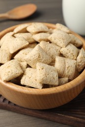 Photo of Delicious corn pads on wooden table, closeup