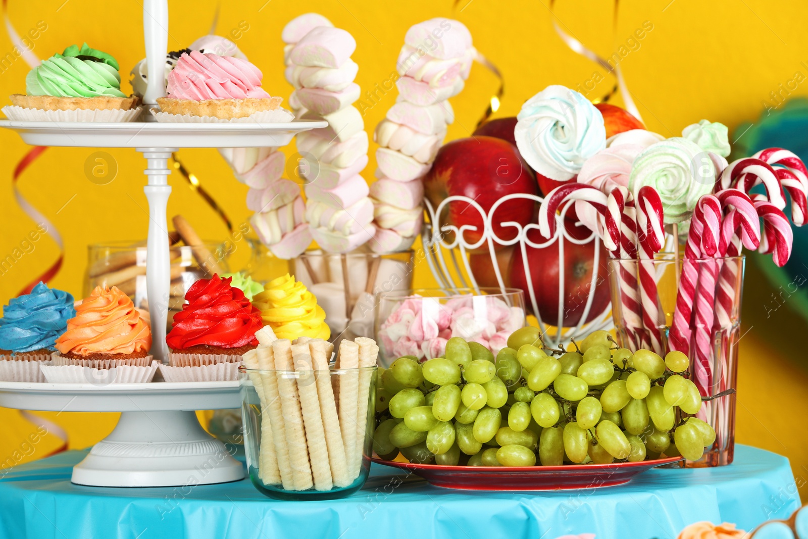 Photo of Candy bar with delicious treats for birthday party