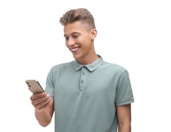 Photo of Happy young man sending message via smartphone on white background