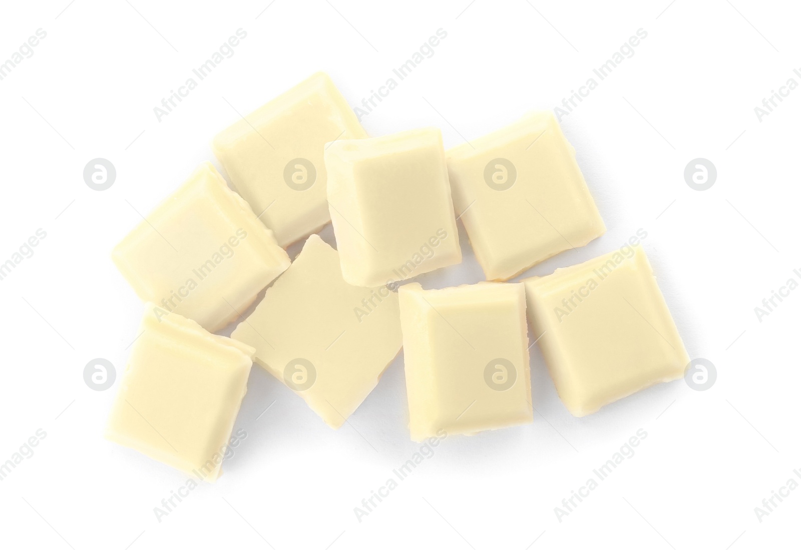 Photo of Delicious chocolate pieces on white background, top view