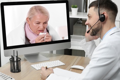 Image of Hotline service. Doctor consulting patient online via computer indoors