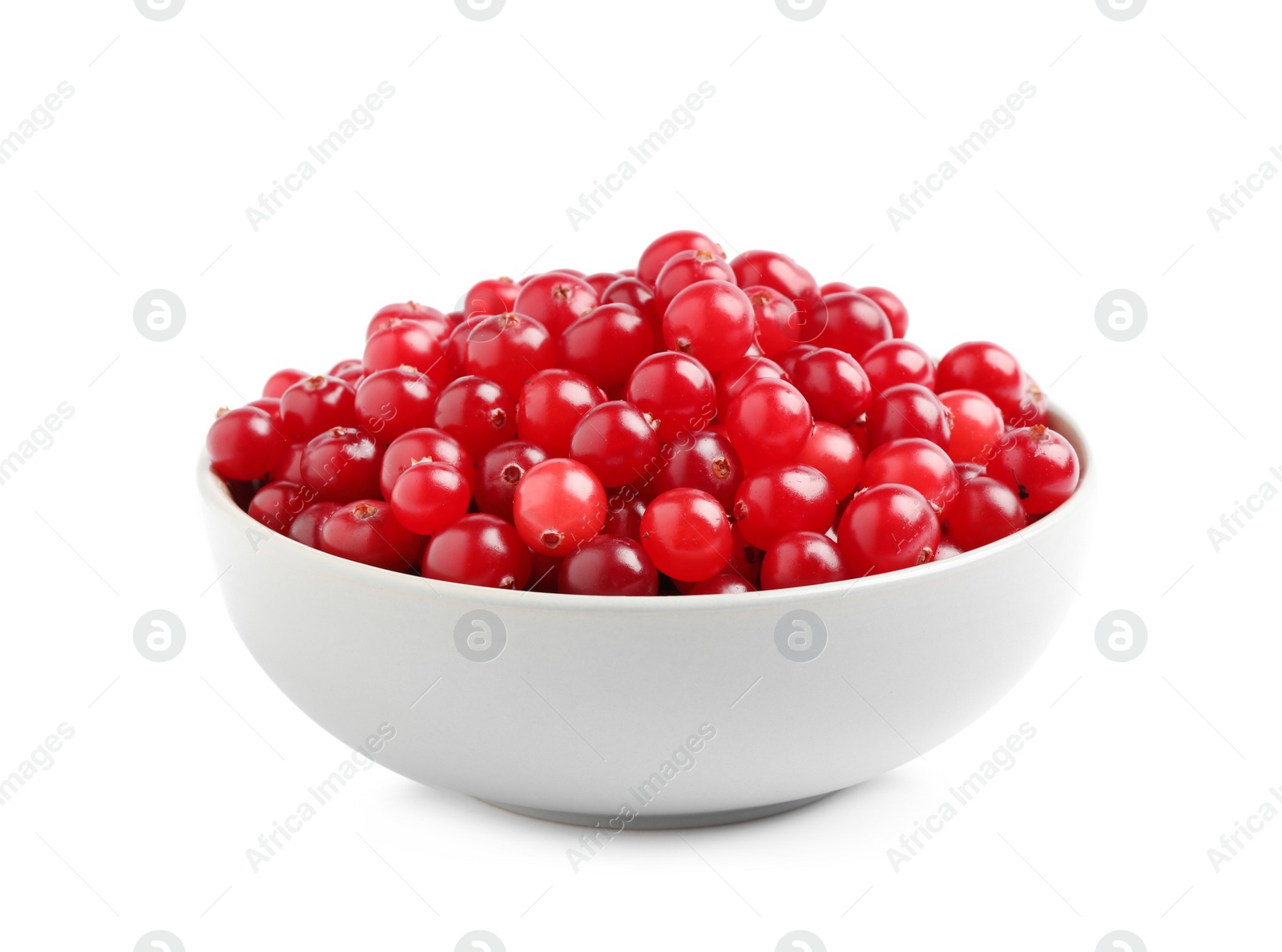 Photo of Fresh ripe cranberries in bowl isolated on white