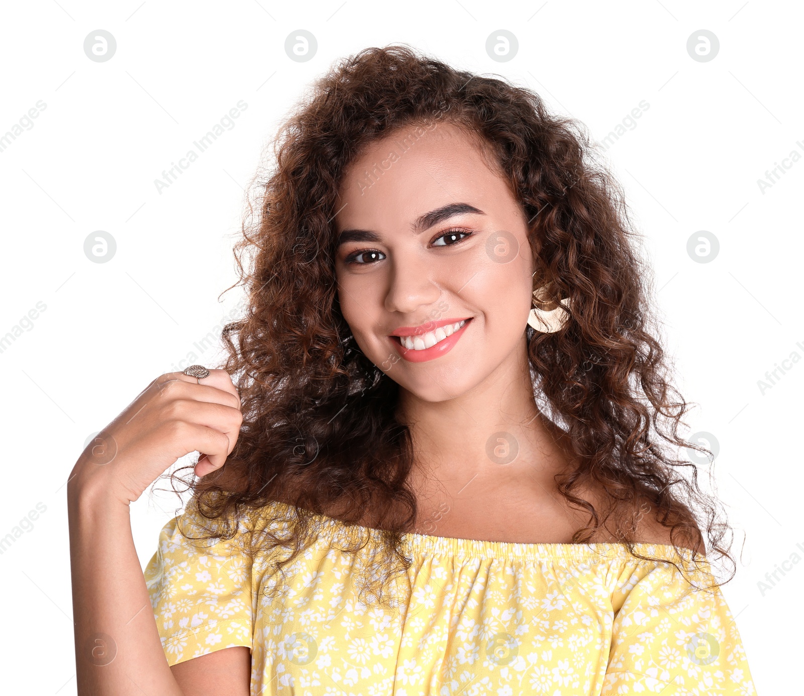 Photo of Portrait of beautiful laughing African-American woman on white background