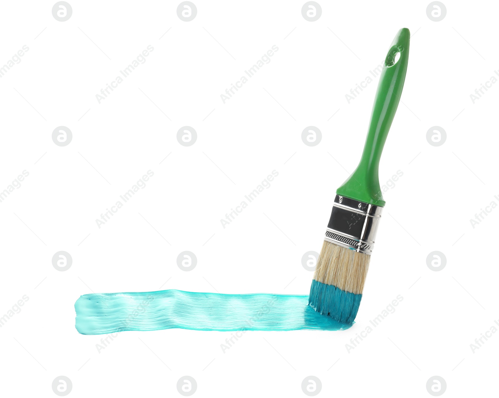 Photo of Brush with green paint on white background