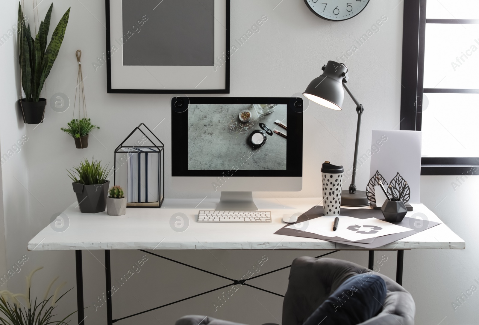 Photo of Stylish workplace with modern computer on desk