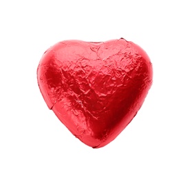Photo of Heart shaped chocolate candy in red foil isolated on white, top view