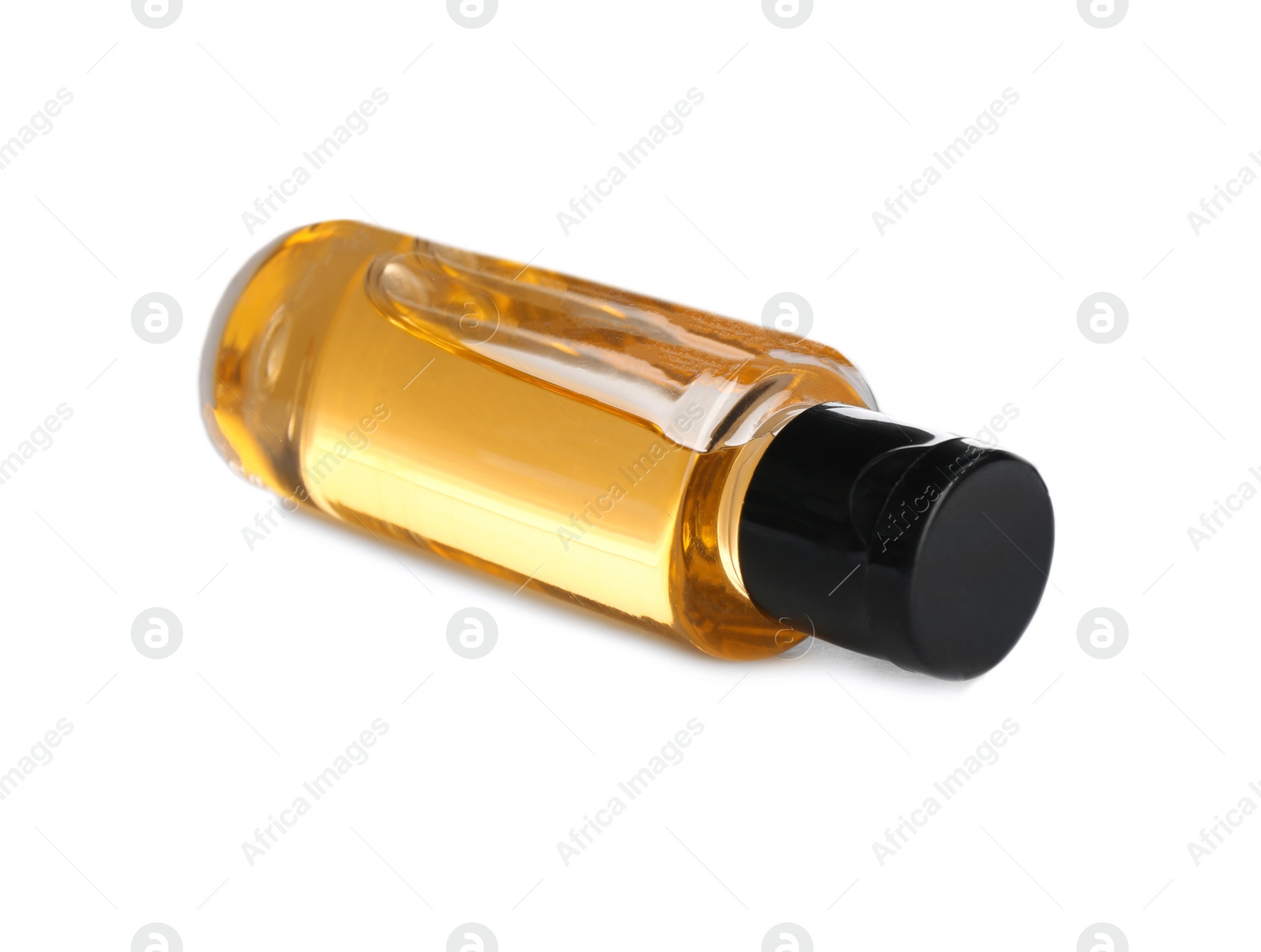 Photo of Mini bottle with cosmetic product on white background. Hotel amenity