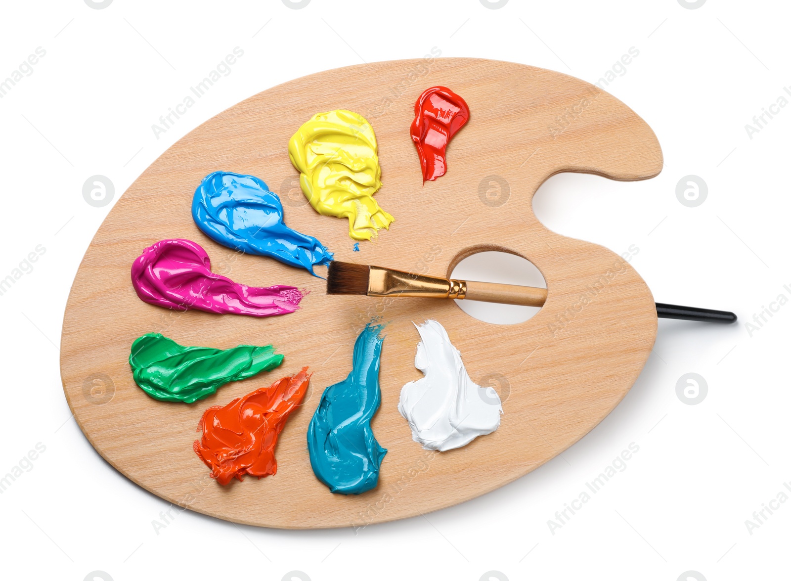 Photo of Palette with paints and brush on white background, top view. Artist equipment