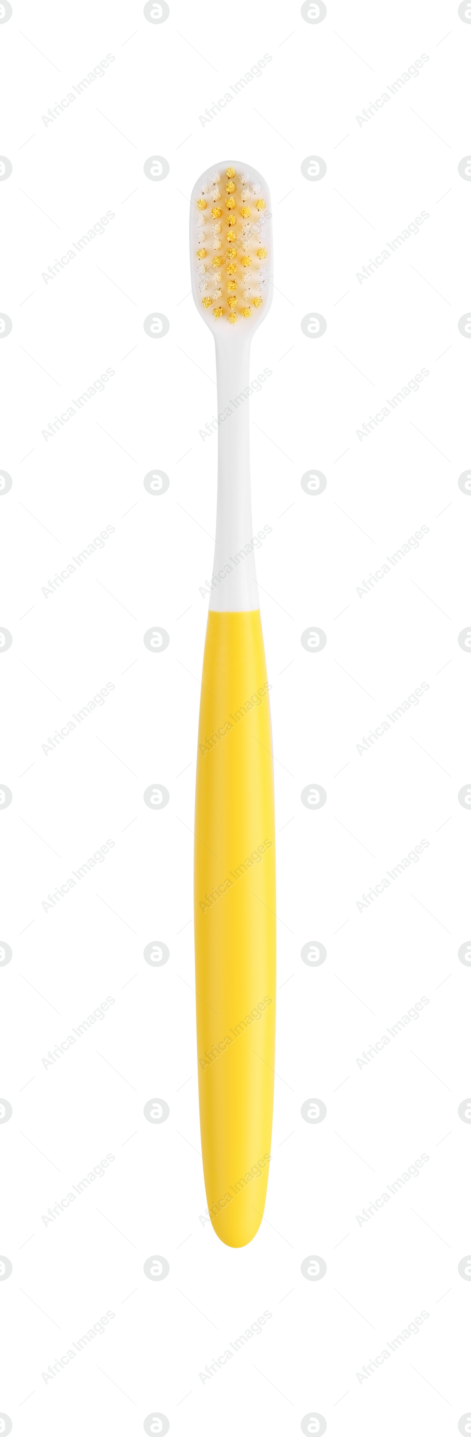 Photo of Yellow plastic toothbrush isolated on white. Dental care