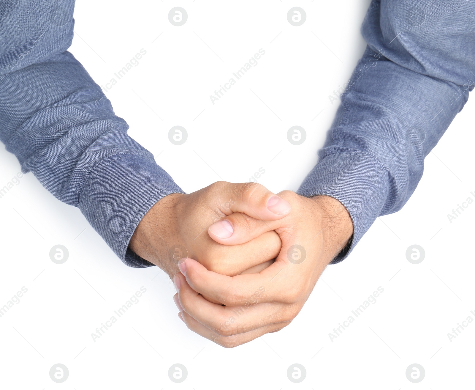 Photo of Man on white background, top view. Closeup of hands